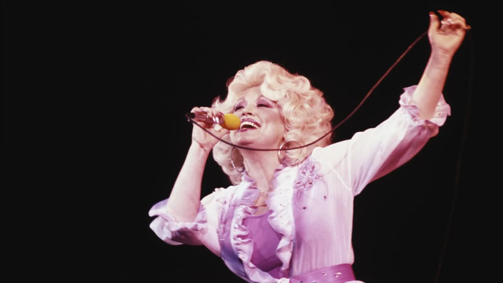 Dolly Parton's 'label upgrade' trick to disarm condescension, per expert